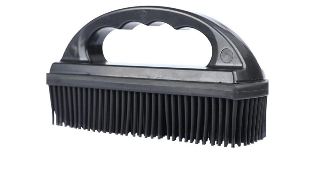 Godiyyer Rubber Pet Hair Removal Brush removing pet hair from furniture, carpets, and clothes.