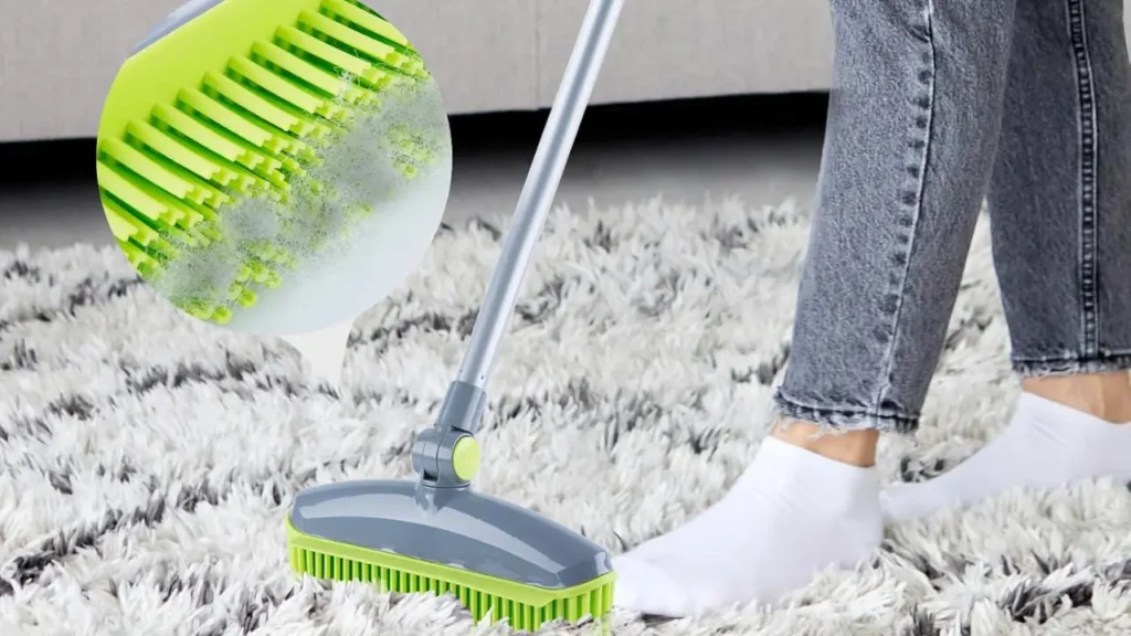 Rotating Rubber Broom bristles removing pet hair from  carpet