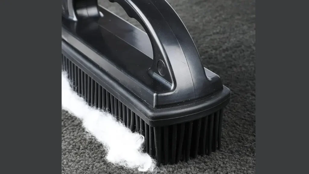 lose-up of brush for clothing and furniture removing hair from 